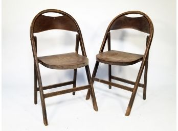 A Pair Of Wood Folding Chairs