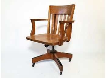 An Antique Oak Jurors Chair