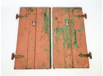 A Pair Of Rustic Wood Shutters