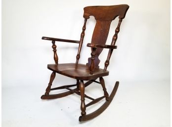 An Antique Oak Rocking Chair