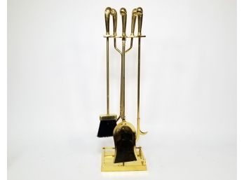 A Set Of Heavy Brass Fireplace Tools