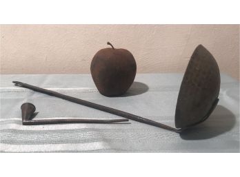 Ladle, Pipe And Apple