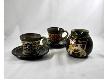 Pastoral Painted Ceramic Tea Cups, Saucers, And Creamer