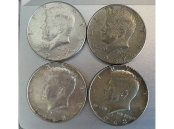 Four Kennedy Half Dollars 1968D