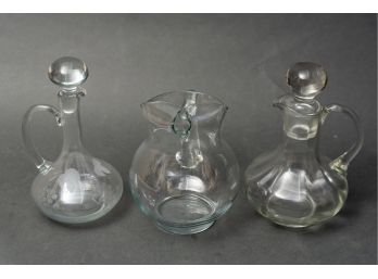 Three Cut Crystal Pitchers