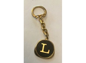 Gold Tone Key Chain With The Letter 'L'