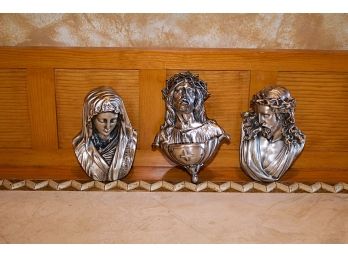 Three Metal Religious Figures