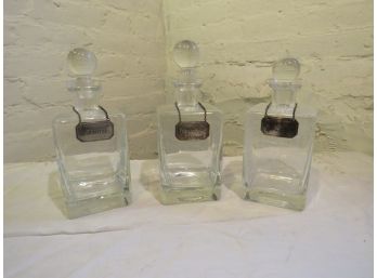 3 Clear Glass Liquor Decanters With Tags