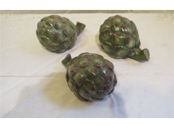 A Trio Of Williams-Sonoma Ceramic Artichokes