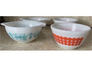 Four Small Pyrex Bowls