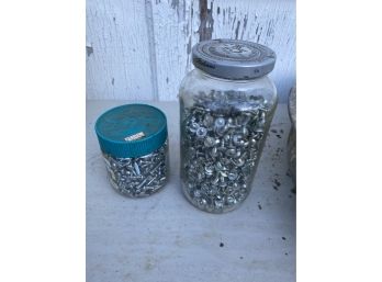 Two Jars Of Small Screws