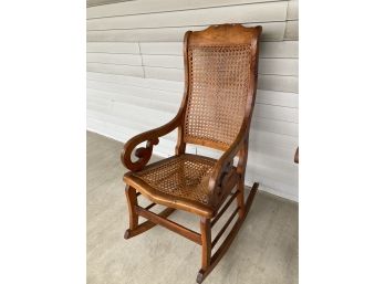 Beautiful 19TH Century Antique Rocking Chair With Cane Seat.