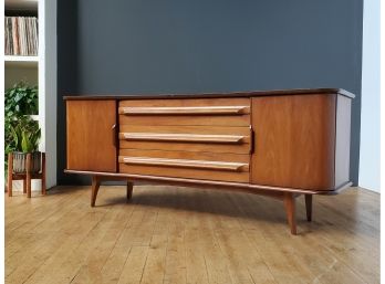 United Curved Front Mid Century Walnut 9 Drawer Lowboy