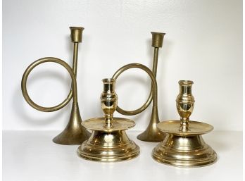 Two Pairs Of Brass Candlesticks