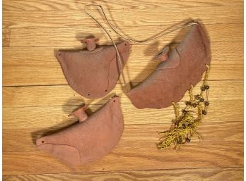 A Trio Of Primitive Wall Vases