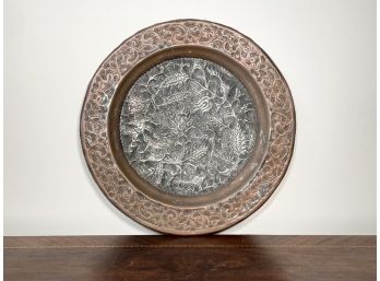 An Antique Copper Repousse Platter