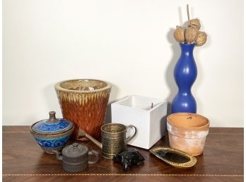 A Collection Of Pottery And Decor