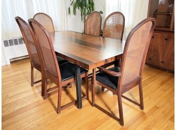 A Stunning Mid Century Modern Rosewood Dining Table And Cane Chairs