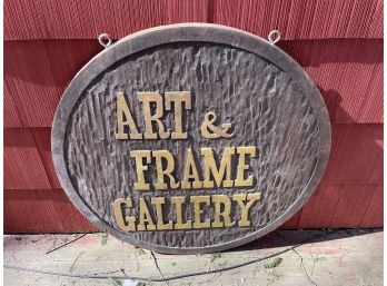 A Local Hand Carved Shop Sign