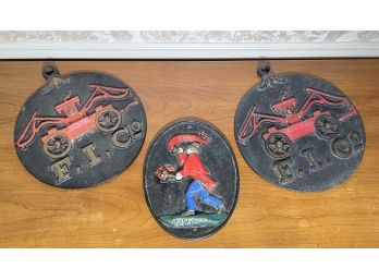 A Trio Of Vintage Cast Iron Fire Company Wall Plaques