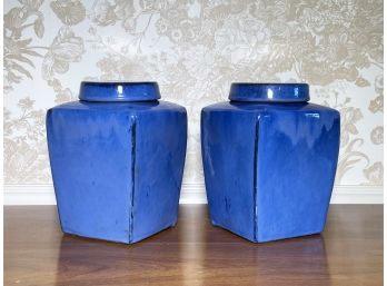 A Pair Of Large Glazed Earthenware Lidded Cannisters