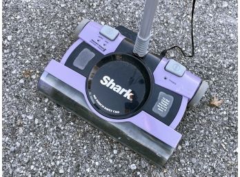 A Shark Electric Vacuum