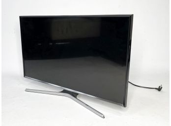 A Samsug 32' Flat Screen TV