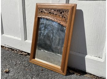 A Hand Carved Exotic Hardwood Mirror