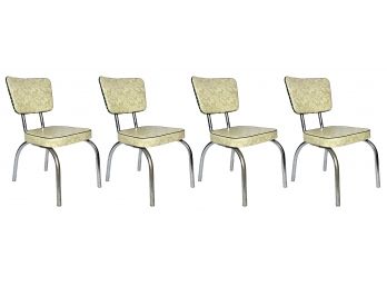 A Set Of 4 1950's Vinyl And Chrome Dining Chairs