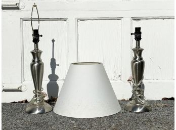 A Pair Of Brushed Steel Lamps