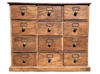 A Vintage Exotic Hardwood Apothecary Cabinet