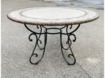 A Wrought Iron And Acrylic Outdoor Table