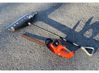 A Hedge Trimmer And Snow Shovel