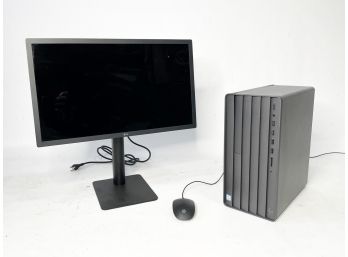 An HP Computer, LG Monitor, And Mouse