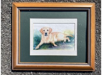 A Framed Watercolor Of A Puppy