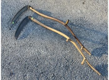 A Pair Of Antique Metal Scythes