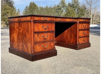 A Massive Vintage Burled Mahogany Desk