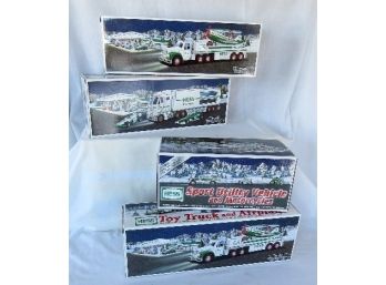 Lot Of 4 Brand New In The Box Hess Trucks 2002 (2), 2003 & 2004