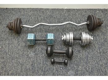 Assortment Of Free Weights And Dumbbells