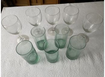 Collection Of Green And Clear Glasses