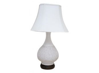 Exquisite Ceramic Table Lamp On Wooden Base With Flower Etchings And A Bell Shape Shade