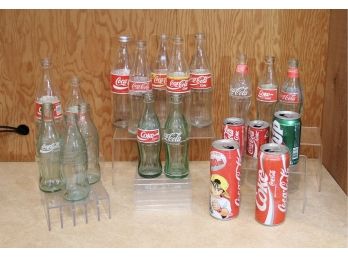 Collection Of Coca Cola Bottles And Cans From USA And Other Countries