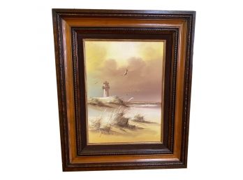 Framed Oil On Canvas Of A Beach With A Lighthouse