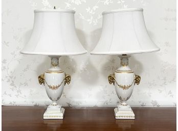 A Pair Of Vintage Urn Form Parcel Gilt Porcelain Lamps After Sevres