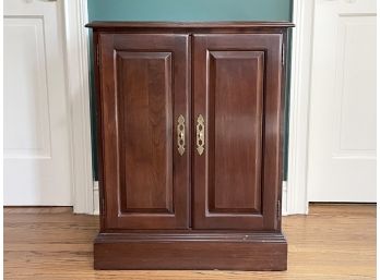 A Vintage Paneled Mahogany Cabinet