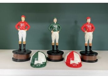 A Collection Of Vintage '21 Club' Jockey And Helmet Bottle Openers