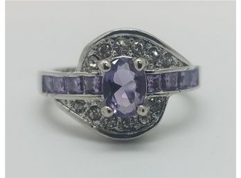 Lovely Silver Plated Size 7 Ring With Faux Purple Stones. Marked 925