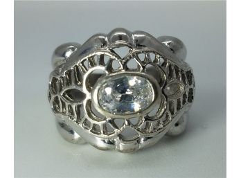 Vintage Sterling Silver Size 5 1/2 Ring With A Large CZ In The Cented Of A Reticulated Body