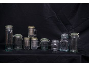 A Lot Of Mason Jars And Glass Canisters