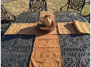 Two Embroidered Velour Table Runners With Rattan Place Mats And Ceramic Pitcher